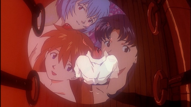 Shinji, Misato, Asuka e Rei – scena del treno