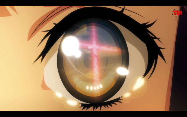 L'esplosione a forma di croce riflessa nell'occhio di Haruka