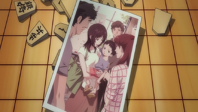  Misteriosa foto che ritrae Yui, Shinji e Mari